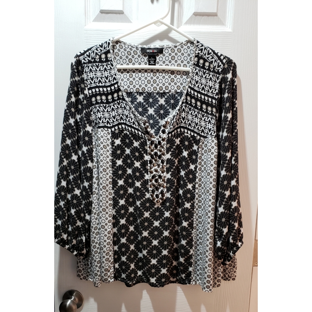 Unique loose sleeved top.